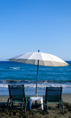 Fototapeta na wymiar White Beach Umbrella