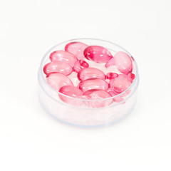gelatin pills on white background