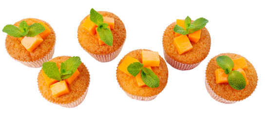 Tasty pumpkin muffins, isolated on white