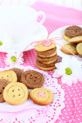 Sugar cookies in shape of buttons on table