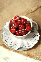 Sweet cherries on wooden table