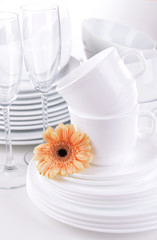 Set of white dishes close-up