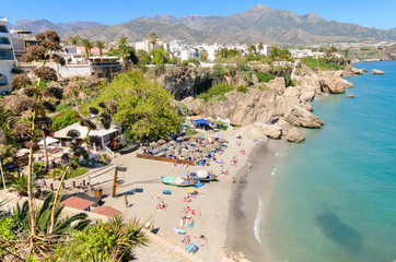 Nerja beach, touristic town in costa del sol, Malaga, Spain. - obrazy, fototapety, plakaty