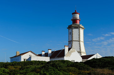 Fototapeta na wymiar Espichel Cape Lighthouse in Sesimbra, Portugal