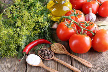 Fresh vegetables with herbs and spices on table, close-up