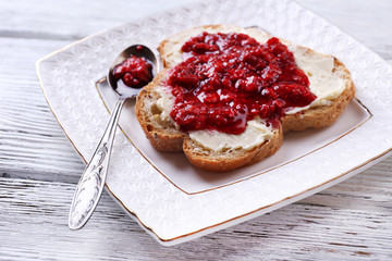 Fresh toast with  homemade butter and raspberry jam