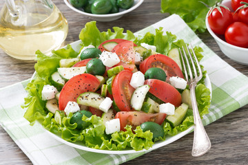 fresh green salad with vegetables and feta