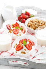 healthy breakfast - yogurt, strawberries, granola