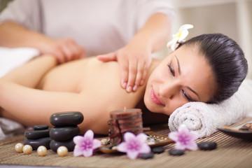 Fototapeta na wymiar woman having a wellness back massage