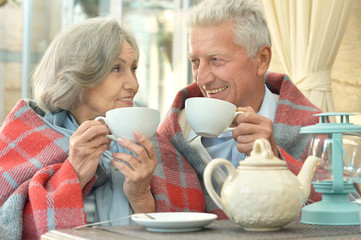 old couple drinking tea
