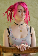 young Woman with Red Hairs on Stool