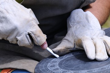 Artisan carved slate.