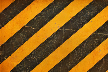 Black and yellow hazard lines with grunge effects