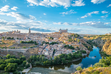 Panoramic view of the historic city of Toledo with river Tajo in - obrazy, fototapety, plakaty