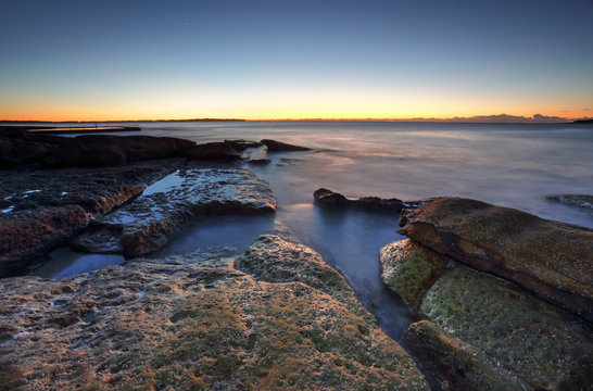 Dawn coast on the rocks at Cronulla, Australia