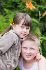 little girl and brother