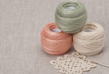 Crochet Lace And Threads. Natural Linen Background