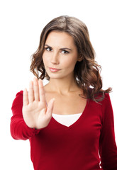 Serious woman with stop gesture, isolated - obrazy, fototapety, plakaty