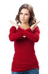 Serious woman with stop gesture, isolated