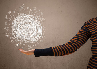 Chaos concept in the hand of a woman