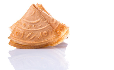 Kuih Kapit or the  Chinese Love Letter biscuit over white 