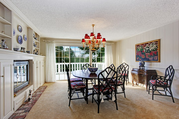 Old fashion dining room interior with fireplace