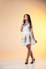 Romantic beautiful woman wearing white dress