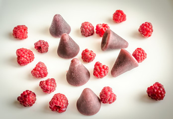 Cuberdons with fresh raspberries