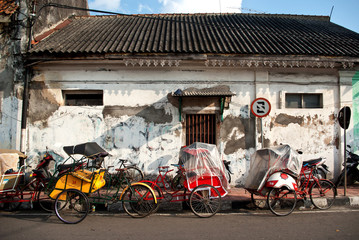 tricycles on the street side