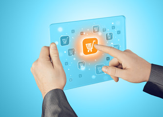 Businessman pushing shopping cart