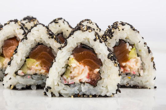 triangular sushi with sesame seeds