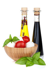 Mozzarella cheese with cherry tomatoes and basil