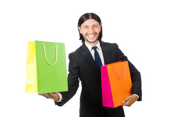Man with shopping bags isolated on white