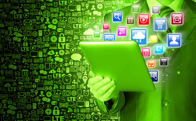 Business man use tablet pc with colorful application icons