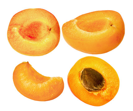 slices of ripe apricots isolated on the white background