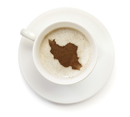 Cup of coffee with foam and powder in the shape of Iran.(series)