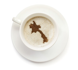 Cup of coffee with foam and powder in the shape of Laos.(series)