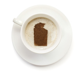 Cup of coffee with foam and powder in the shape of Northern Terr