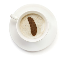 Cup of coffee with foam and powder in the shape of Howand Island