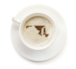 Cup of coffee with foam and powder in the shape of Maryland.(ser