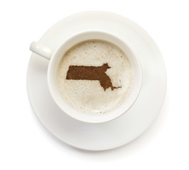Cup of coffee with foam and powder in the shape of Massachusetts
