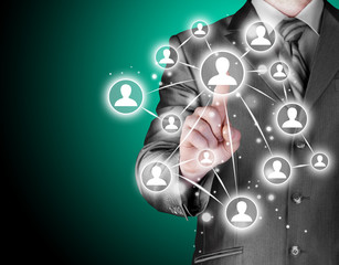 Businessman pressing modern social buttons