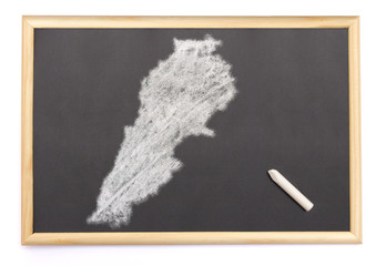 Blackboard with a chalk and the shape of Lebanon drawn onto. (se