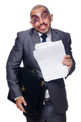Badly beaten businessman isolated on white