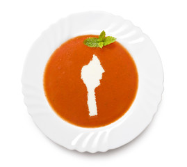 Plate tomato soup with cream in the shape of Benin.(series)