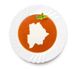 Plate tomato soup with cream in the shape of Botswana.(series)