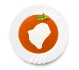 Plate tomato soup with cream in the shape of Burundi.(series)