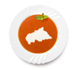Plate tomato soup with cream in the shape of Central African Rep