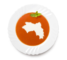 Plate tomato soup with cream in the shape of Guinea.(series)