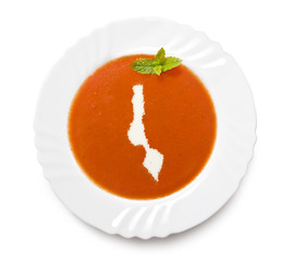 Plate tomato soup with cream in the shape of Malawi.(series)